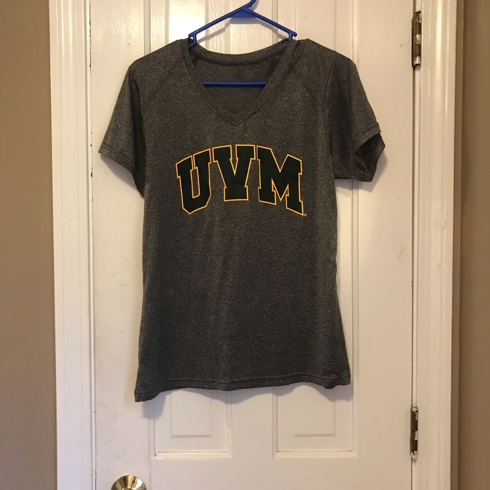 Woman’s University of Vermont technical T-shirt.